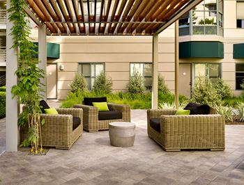 Beautifully landscaped courtyards with tranquil seating areas